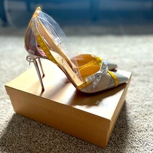 CHRISTIAN LOUBOUTIN 
Patent Ruban Calfskin Metripump 100 Pumps 38.5